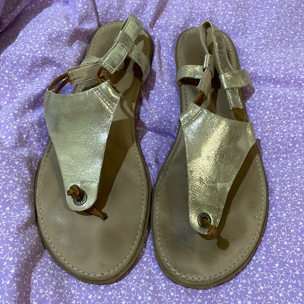 Gold Sperry top-slide sandals